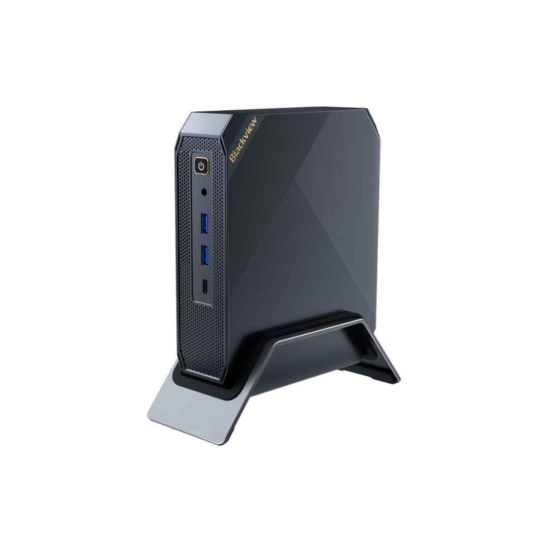 BlackView i9 Mini PC in a sleek, angular black design, standing upright on a stand. The front panel features a power button, two USB ports, and an additional port, with the BlackView logo displayed near the top edge.